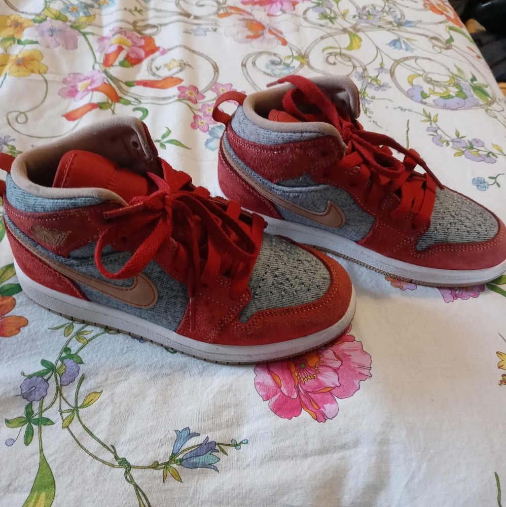 Red and blue jean colored Nike Jordan's size 13C.